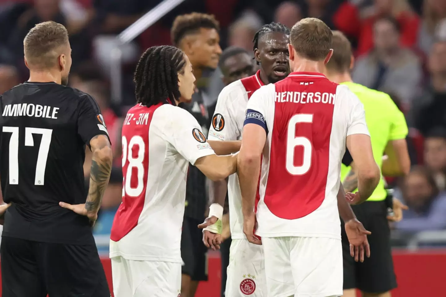 Jordan Henderson and Bertrand Traore had to be seperated by their teammates. (Image: Getty)