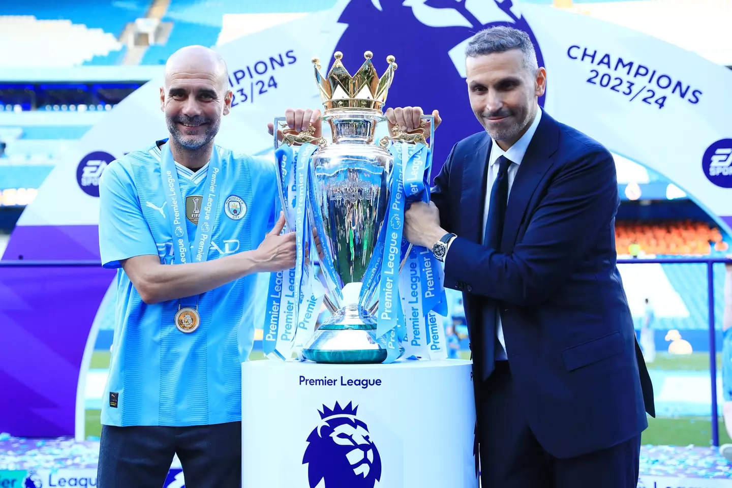 Pep Guardiola and Khaldoon Al Mubarak celebrate Manchester City's Premier League triumph last season. Image: Getty